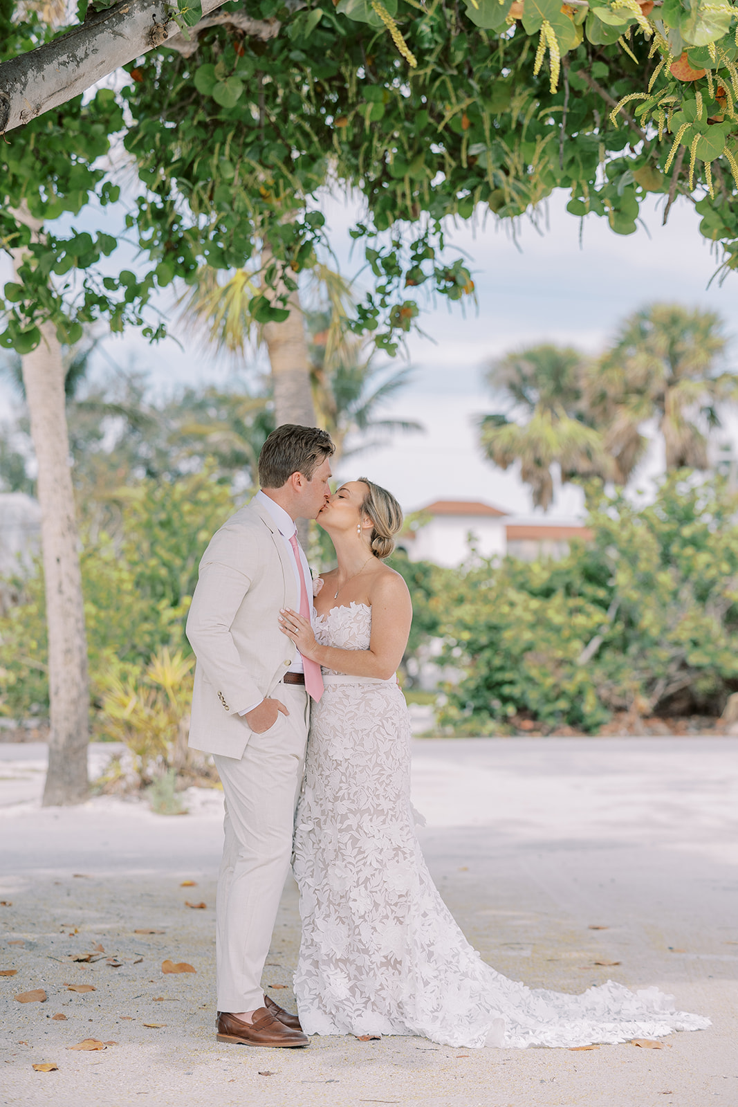 Wedding portraits in Boca Grande Florida under tropical tree